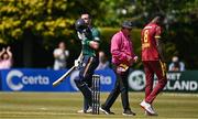 21 May 2025; Ireland batter Andrew Balbirnie, left, celebrates after bringing up his century during the first match of the One Day International Series between Ireland and the West Indies at Clontarf Cricket Club in Dublin. Photo by Sam Barnes/Sportsfile