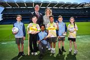 21 May 2025; In attendance at the GAA Cúl Camps Partnership with the Department of Education and Youth and the Tusla Education Support Services (TESS) Announcement at Croke Park in Dublin are, back row, Uachtarán Chumann Lúthchleas Gael Jarlath Burns and Minister for Education and Youth Helen McEntee TD, with pupils from O'Connell's Primary School, front row from left, Ivan Egan, Kaydi Rae Shannon, Ayub Ali, Isaiah Ogorro, Leroy Ward and, Dezara Grouse. Photo by Seb Daly/Sportsfile