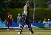 21 May 2025; Ireland batter Harry Tector celebrates bringing up his half century during the first match of the One Day International Series between Ireland and the West Indies at Clontarf Cricket Club in Dublin. Photo by Sam Barnes/Sportsfile