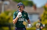 21 May 2025; Ireland batter Harry Tector leaves the field after being caught out by Brandon King of West Indies during the first match of the One Day International Series between Ireland and the West Indies at Clontarf Cricket Club in Dublin. Photo by Sam Barnes/Sportsfile