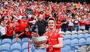 11 May 2025; Tommy Durnin of Louth holds the Delaney Cup for a picture in front of the Louth supporters in the Hogan Stand after their side's victory in the Leinster GAA Football Senior Championship final match between Louth and Meath at Croke Park in Dublin. Photo by Piaras Ó Mídheach/Sportsfile
