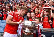 11 May 2025; Conor Grimes of Louth shows the Delaney Cup to supporters after victory in the Leinster GAA Football Senior Championship final match between Louth and Meath at Croke Park in Dublin. Photo by Piaras Ó Mídheach/Sportsfile