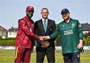 23 May 2025; West Indies captain Shai Hope, left, and Ireland captain Paul Stirling, right, shake hands, watched by match referee Dean Cosker, centre, before the second match of the One Day International Series between Ireland and the West Indies at Clontarf Cricket Club in Dublin. Photo by Sam Barnes/Sportsfile