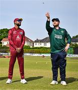 23 May 2025; Ireland captain Paul Stirling, right, makes the toss watched by West Indies captain Shai Hope, left, before the second match of the One Day International Series between Ireland and the West Indies at Clontarf Cricket Club in Dublin. Photo by Sam Barnes/Sportsfile