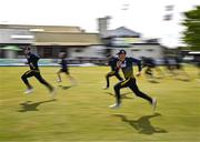 23 May 2025; Ireland players warm up before the second match of the One Day International Series between Ireland and the West Indies at Clontarf Cricket Club in Dublin. Photo by Sam Barnes/Sportsfile