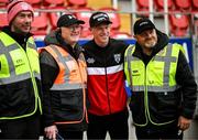 23 May 2025; Former Republic of Ireland and Derry City player James McClean poses for a photograph with stewards before the SSE Airtricity Men's Premier Division match between Derry City and Shamrock Rovers at The Ryan McBride Brandywell Stadium in Derry. Photo by Stephen McCarthy/Sportsfile