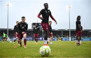 23 May 2025; Drogheda United players, including Bridel Bosakani, centre, warm up before the SSE Airtricity Men's Premier Division match between Drogheda United and Bohemians at Sullivan & Lambe Park in Drogheda, Louth. Photo by Shauna Clinton/Sportsfile