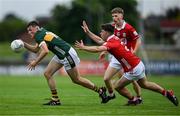 23 May 2025; Mark O’Carroll of Kerry in action against Ben Coffey of Cork during the Electric Ireland Munster GAA Football Minor Championship final match between Kerry and Cork at Austin Stack Park in Tralee, Kerry. Photo by Brendan Moran/Sportsfile