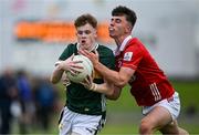 23 May 2025; Nick Lacey of Kerry in action against Ben Coffey of Cork during the Electric Ireland Munster GAA Football Minor Championship final match between Kerry and Cork at Austin Stack Park in Tralee, Kerry. Photo by Brendan Moran/Sportsfile