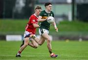 23 May 2025; Gearóid White of Kerry in action against Ronan Hayes of Cork during the Electric Ireland Munster GAA Football Minor Championship final match between Kerry and Cork at Austin Stack Park in Tralee, Kerry. Photo by Brendan Moran/Sportsfile