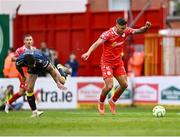 23 May 2025; John O'Sullivan of Shelbourne gets away from John Mahon of Sligo Rovers during the SSE Airtricity Men's Premier Division match between Shelbourne and Sligo Rovers at Tolka Park in Dublin. Photo by Piaras Ó Mídheach/Sportsfile