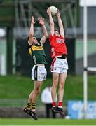 23 May 2025; Brian Cronin of Cork in action against Mark O’Carroll of Kerry during the Electric Ireland Munster GAA Football Minor Championship final match between Kerry and Cork at Austin Stack Park in Tralee, Kerry. Photo by Brendan Moran/Sportsfile