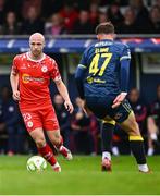 23 May 2025; Kerr McInroy of Shelbourne in action against Owen Elding of Sligo Rovers during the SSE Airtricity Men's Premier Division match between Shelbourne and Sligo Rovers at Tolka Park in Dublin. Photo by Piaras Ó Mídheach/Sportsfile
