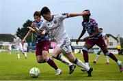 23 May 2025; Colm Whelan of Bohemians in action against Owen Lambe of Drogheda United during the SSE Airtricity Men's Premier Division match between Drogheda United and Bohemians at Sullivan & Lambe Park in Drogheda, Louth. Photo by Shauna Clinton/Sportsfile