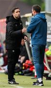23 May 2025; Fourth official Glen Geraghty speaks to Cork City manager Ger Nash during the SSE Airtricity Men's Premier Division match between Galway United and Cork City at Eamonn Deacy Park in Galway. Photo by Thomas Flinkow/Sportsfile