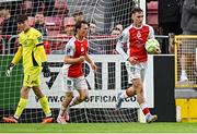 23 May 2025; Mason Melia of St Patrick's Athletic, right, after scoring their side's first goal during the SSE Airtricity Men's Premier Division match between St Patrick's Athletic and Waterford at Richmond Park in Dublin. Photo by Seb Daly/Sportsfile