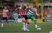 23 May 2025; Graham Burke of Shamrock Rovers in action against Mark Connolly of Derry City during the SSE Airtricity Men's Premier Division match between Derry City and Shamrock Rovers at The Ryan McBride Brandywell Stadium in Derry. Photo by Stephen McCarthy/Sportsfile