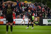 23 May 2025; Mason Melia of St Patrick's Athletic, centre, after scoring their side's second goal during the SSE Airtricity Men's Premier Division match between St Patrick's Athletic and Waterford at Richmond Park in Dublin. Photo by Seb Daly/Sportsfile