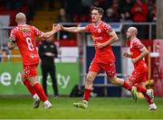 23 May 2025; John Martin of Shelbourne celebrates with team-mate Mark Coyle, 8, after scoring their side's first goal during the SSE Airtricity Men's Premier Division match between Shelbourne and Sligo Rovers at Tolka Park in Dublin. Photo by Piaras Ó Mídheach/Sportsfile