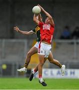23 May 2025; Joe Miskella of Cork in action against Marcus Clifford of Kerry during the Electric Ireland Munster GAA Football Minor Championship final match between Kerry and Cork at Austin Stack Park in Tralee, Kerry. Photo by Brendan Moran/Sportsfile