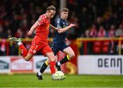 23 May 2025; Harry Wood of Shelbourne gets away from Conor Reynolds of Sligo Rovers during the SSE Airtricity Men's Premier Division match between Shelbourne and Sligo Rovers at Tolka Park in Dublin. Photo by Piaras Ó Mídheach/Sportsfile