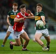 23 May 2025; Ben Kelliher of Kerry in action against Ben Coffey of Cork during the Electric Ireland Munster GAA Football Minor Championship final match between Kerry and Cork at Austin Stack Park in Tralee, Kerry. Photo by Brendan Moran/Sportsfile