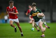 23 May 2025; Gearóid White of Kerry in action against Ronan Hayes of Cork during the Electric Ireland Munster GAA Football Minor Championship final match between Kerry and Cork at Austin Stack Park in Tralee, Kerry. Photo by Brendan Moran/Sportsfile