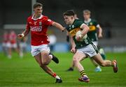 23 May 2025; Gearóid White of Kerry in action against Ronan Hayes of Cork during the Electric Ireland Munster GAA Football Minor Championship final match between Kerry and Cork at Austin Stack Park in Tralee, Kerry. Photo by Brendan Moran/Sportsfile