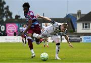 23 May 2025; Ross Tierney of Bohemians in action against Elicha Ahui of Drogheda United during the SSE Airtricity Men's Premier Division match between Drogheda United and Bohemians at Sullivan & Lambe Park in Drogheda, Louth. Photo by Shauna Clinton/Sportsfile