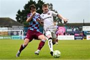 23 May 2025; Ross Tierney of Bohemians in action against Owen Lambe of Drogheda United during the SSE Airtricity Men's Premier Division match between Drogheda United and Bohemians at Sullivan & Lambe Park in Drogheda, Louth. Photo by Shauna Clinton/Sportsfile