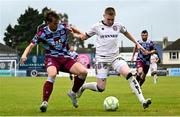 23 May 2025; Ross Tierney of Bohemians in action against Owen Lambe of Drogheda United during the SSE Airtricity Men's Premier Division match between Drogheda United and Bohemians at Sullivan & Lambe Park in Drogheda, Louth. Photo by Shauna Clinton/Sportsfile