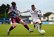 23 May 2025; Ross Tierney of Bohemians in action against Owen Lambe of Drogheda United during the SSE Airtricity Men's Premier Division match between Drogheda United and Bohemians at Sullivan & Lambe Park in Drogheda, Louth. Photo by Shauna Clinton/Sportsfile