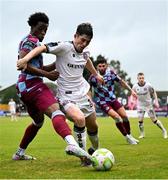 23 May 2025; Colm Whelan of Bohemians in action against Elicha Ahui of Drogheda United during the SSE Airtricity Men's Premier Division match between Drogheda United and Bohemians at Sullivan & Lambe Park in Drogheda, Louth. Photo by Shauna Clinton/Sportsfile