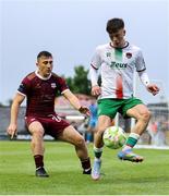 23 May 2025; Cathal O'Sullivan of Cork City in action against Ed McCarthy of Galway United during the SSE Airtricity Men's Premier Division match between Galway United and Cork City at Eamonn Deacy Park in Galway. Photo by Thomas Flinkow/Sportsfile
