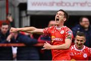 23 May 2025; John Martin of Shelbourne, left, celebrates with team-mate Tyreke Wilson after scoring their side's third goal, for his hat-trick, during the SSE Airtricity Men's Premier Division match between Shelbourne and Sligo Rovers at Tolka Park in Dublin. Photo by Piaras Ó Mídheach/Sportsfile
