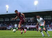23 May 2025; Robert Slevin of Galway United in action against Seani Maguire of Cork City during the SSE Airtricity Men's Premier Division match between Galway United and Cork City at Eamonn Deacy Park in Galway. Photo by Thomas Flinkow/Sportsfile