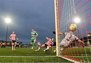 23 May 2025; Aaron McEneff of Shamrock Rovers scores his side's second goal past Derry City goalkeeper Brian Maher during the SSE Airtricity Men's Premier Division match between Derry City and Shamrock Rovers at The Ryan McBride Brandywell Stadium in Derry. Photo by Stephen McCarthy/Sportsfile