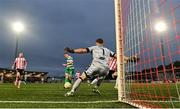 23 May 2025; Aaron McEneff of Shamrock Rovers scores his side's second goal past Derry City goalkeeper Brian Maher during the SSE Airtricity Men's Premier Division match between Derry City and Shamrock Rovers at The Ryan McBride Brandywell Stadium in Derry. Photo by Stephen McCarthy/Sportsfile