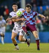 23 May 2025; Andrew Quinn of Drogheda United in action against James Clarke of Bohemians during the SSE Airtricity Men's Premier Division match between Drogheda United and Bohemians at Sullivan & Lambe Park in Drogheda, Louth. Photo by Shauna Clinton/Sportsfile