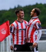 23 May 2025; Danny Mullen, left, celebrates with Derry City team-mate Paul McMullan after scoring their side's goal during the SSE Airtricity Men's Premier Division match between Derry City and Shamrock Rovers at The Ryan McBride Brandywell Stadium in Derry. Photo by Stephen McCarthy/Sportsfile
