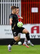 23 May 2025; Tommy Lonergan of Waterford in action against Axel Sjoberg of St Patrick's Athletic during the SSE Airtricity Men's Premier Division match between St Patrick's Athletic and Waterford at Richmond Park in Dublin. Photo by Seb Daly/Sportsfile