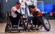 24 May 2025; Seamus Ó Fátharta of Laois Lions in action against Carina Premstaller of Ulster Barbarians during the Irish Wheelchair Rugby League final match between Ulster Barbarians and Laois Lions at the IWA Sports Centre in Clontarf, Dublin. The Irish Wheelchair Rugby League came to its conclusion at IWA-Sport, Clontarf, where Cork’s Rebel Wheelers Multi-Sport Club, Leinster Wheelchair Rugby Club and Ulster Barbarians faced off to decide who’d be crowned league champions. The league went right down to the wire with all three sides still mathematically able to clinch the title. Photo by Tyler Miller/Sportsfile