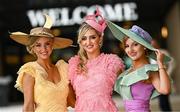 24 May 2025; Sisters, from left, Davinia, Dawn and Cleo Knight from Portarlington, Offaly, during day two of the Tattersalls Irish Guineas Festival at The Curragh Racecourse in Kildare. Photo by Seb Daly/Sportsfile