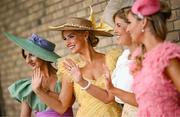 24 May 2025; Racegoers from left, Cleo Knight, Davinia Knight, Marietta Doran, and Dawn Knight, during day two of the Tattersalls Irish Guineas Festival at The Curragh Racecourse in Kildare. Photo by Seb Daly/Sportsfile