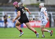 24 May 2025; Ruairí McCrickard of Down in action against Darragh Melville of Kildare during the Joe McDonagh Cup match between Kildare and Down at Cedral St Conleth's in Newbridge, Kildare. Photo by Piaras Ó Mídheach/Sportsfile