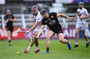 24 May 2025; Cathal Dowling of Kildare in action against Caolan Taggart of Down during the Joe McDonagh Cup match between Kildare and Down at Cedral St Conleth's in Newbridge, Kildare. Photo by Piaras Ó Mídheach/Sportsfile