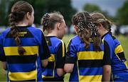 24 May 2025; Moate, Westmeath substitute players look on from the sidelines during the X Rugby 7s Girls match between Moate, Westmeath, and Fethard-Killusty, Tipperary, during day one of the Cairn Community Games Multi-Sports Finals 2025 at Gormanston Park in Meath. Photo by Shauna Clinton/Sportsfile