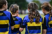 24 May 2025; Moate, Westmeath substitute players look on from the sidelines during the X Rugby 7s Girls match between Moate, Westmeath, and Fethard-Killusty, Tipperary, during day one of the Cairn Community Games Multi-Sports Finals 2025 at Gormanston Park in Meath. Photo by Shauna Clinton/Sportsfile
