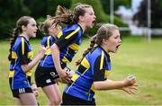 24 May 2025; Moate, Westmeath substitute players cheer on from the sidelines during the X Rugby 7s Girls match between Moate, Westmeath, and Fethard-Killusty, Tipperary, during day one of the Cairn Community Games Multi-Sports Finals 2025 at Gormanston Park in Meath. Photo by Shauna Clinton/Sportsfile