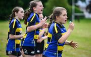 24 May 2025; Moate, Westmeath substitute players cheer on from the sidelines during the X Rugby 7s Girls match between Moate, Westmeath, and Fethard-Killusty, Tipperary, during day one of the Cairn Community Games Multi-Sports Finals 2025 at Gormanston Park in Meath. Photo by Shauna Clinton/Sportsfile